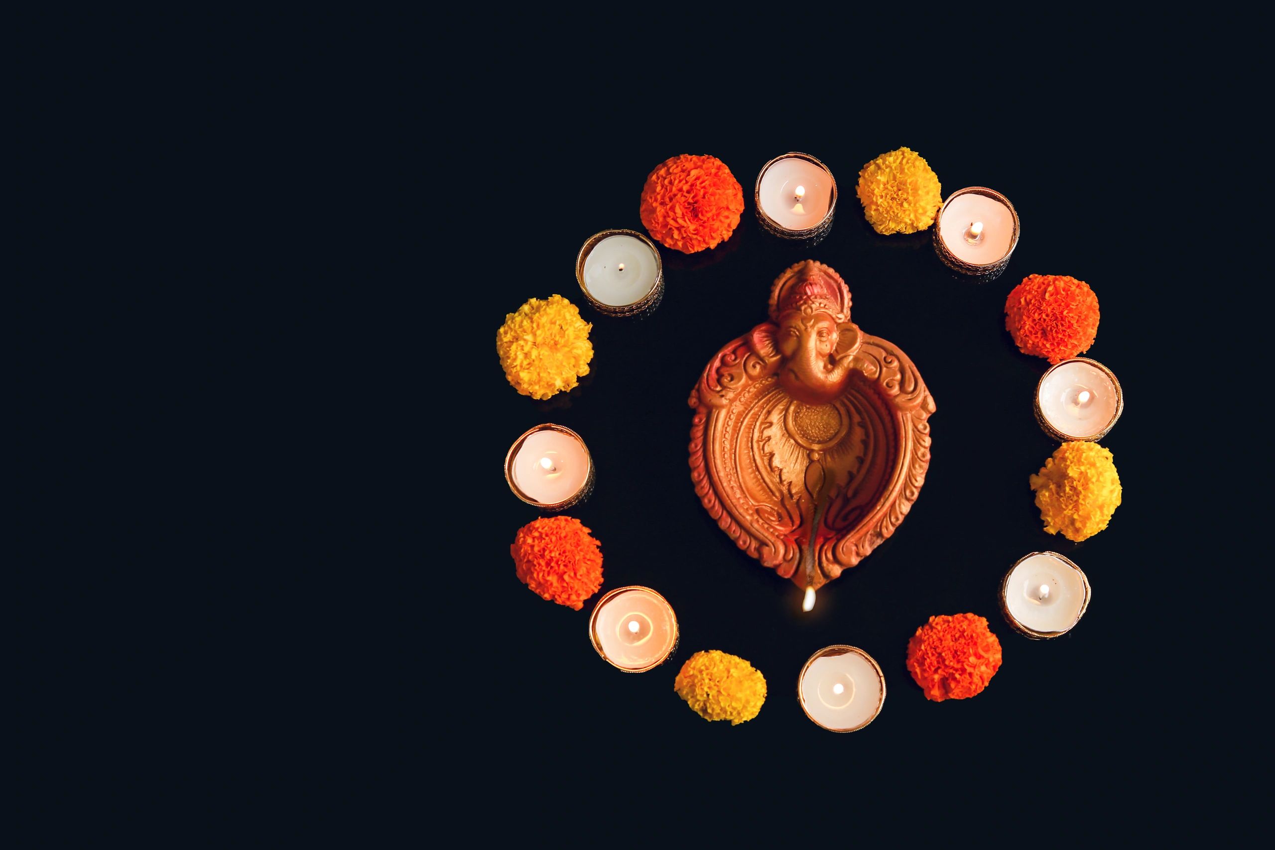 Decorative diya and marigold festive arrangement