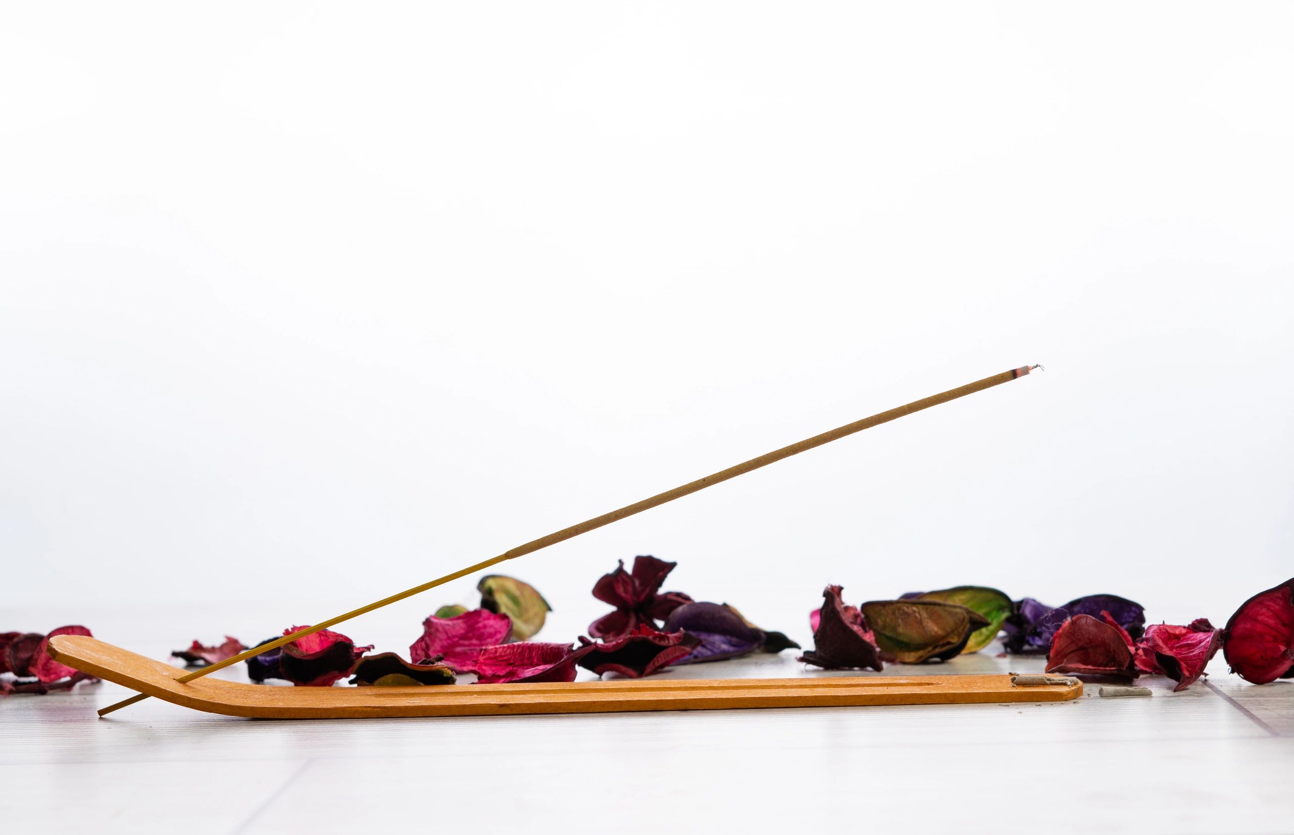 Incense with flower petals for a handcrafted ritual setting