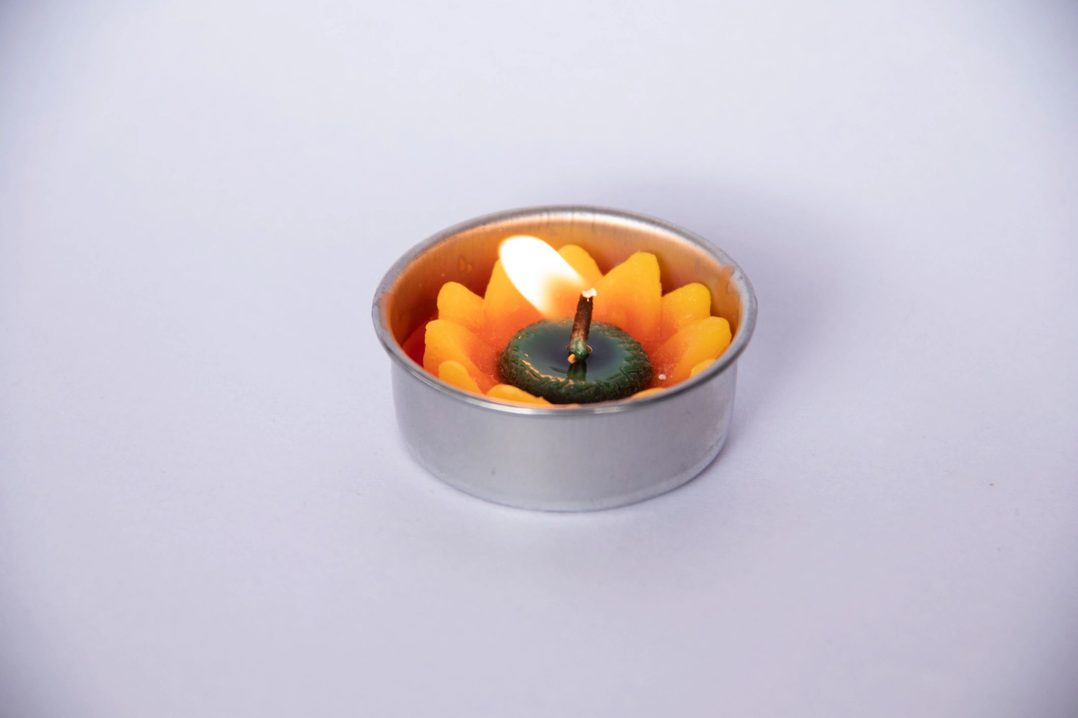 Floral candle accent for festive gifting